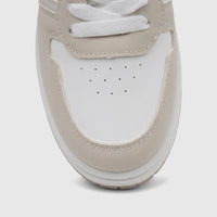 Close-up of a PC Ladies Casual Sneaker in white and beige, showing the toe box and laces from a top-down view.