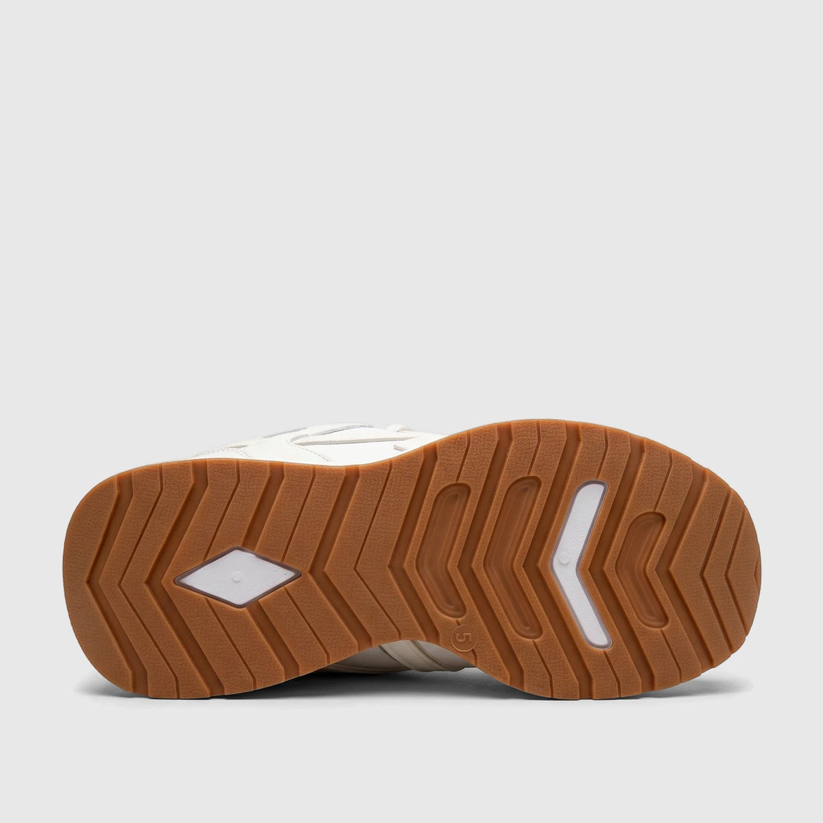 PC Ladies Casual Sneaker with a white and brown rubber sole, featuring a textured tread pattern and white inserts.