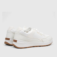 Pair of white PC Ladies Casual Sneakers with brown soles and gold Pierre Cardin branding shown from a side-rear view.