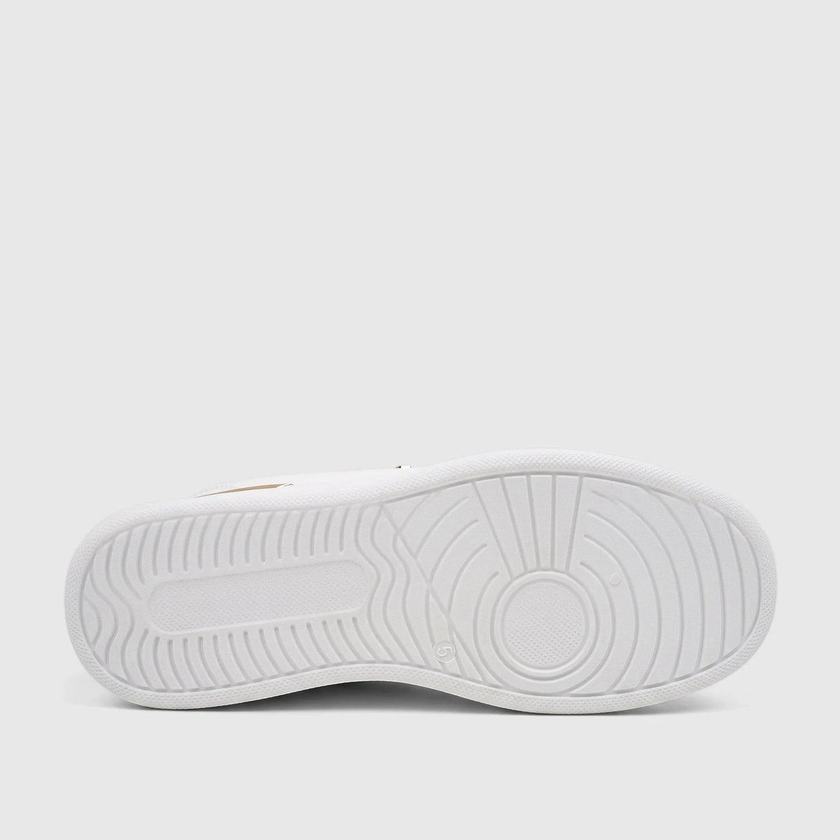 Bottom view of a white PC Ladies Casual Sneaker, showcasing the textured rubber sole with a detailed tread pattern.