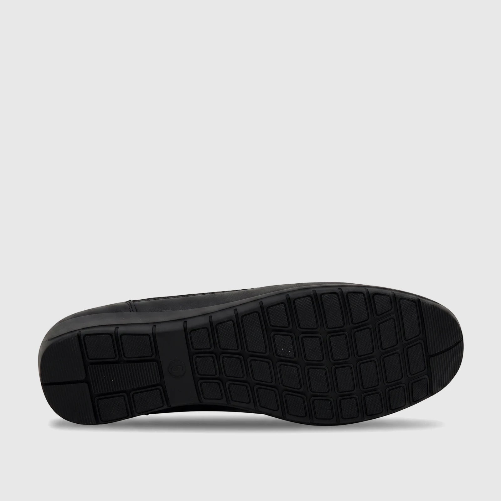 Black PC Ladies Comfort Pump, sole view, featuring a textured rubber outsole with a grid pattern for traction and comfort.