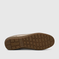 Bottom view of a PC Ladies Comfort Pump in a metallic gold finish with a textured brown rubber sole, showing the size 5