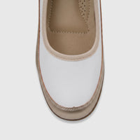Close-up of a white and gold PC Ladies Comfort Pump PCL10965, highlighting its comfortable design and precise stitching.