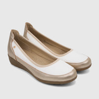 Pair of PC Ladies Comfort Pump PCL10965 low wedge shoes in white and metallic gold, featuring a classic two-tone design and