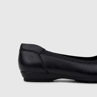 Black PC Ladies Comfort Pump PCL10966 with a low heel, visible from a side angle, showcasing its faux leather texture and