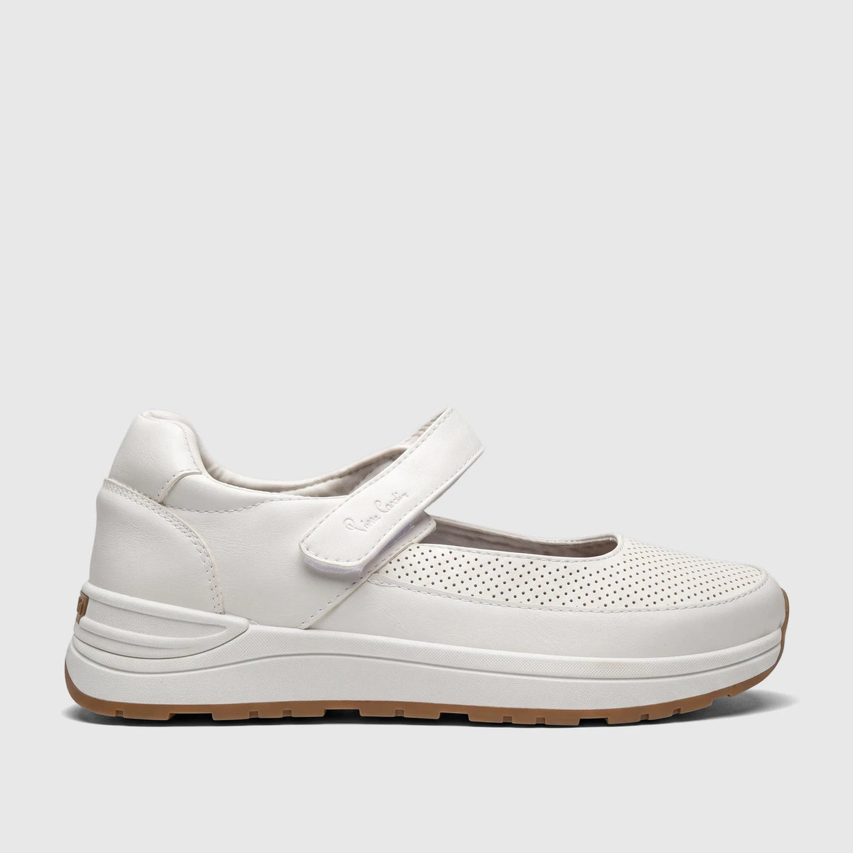 White PC Ladies Comfort Pump PCL10986, a comfort shoe with a velcro strap, perforated upper, and a brown sole, in a side