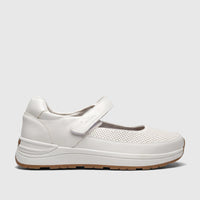 White PC Ladies Comfort Pump PCL10986, a comfort shoe with a velcro strap, perforated upper, and a brown sole, in a side