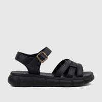 Black PC Ladies Comfort Sandal PCL10974 from a side view, featuring textured straps with a bronze buckle and a comfortable
