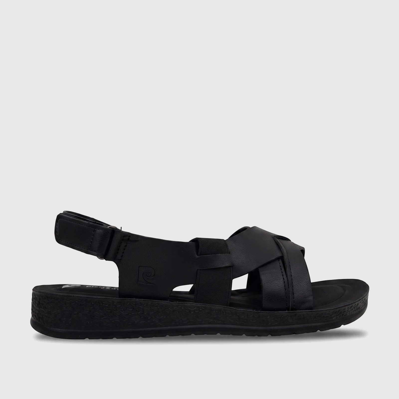 Black PC Ladies Comfort Sandal PCL10975 with crossed straps and an adjustable heel strap, shown in a side view.
