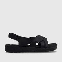 Black PC Ladies Comfort Sandal PCL10975 with crossed straps and an adjustable heel strap, shown in a side view.