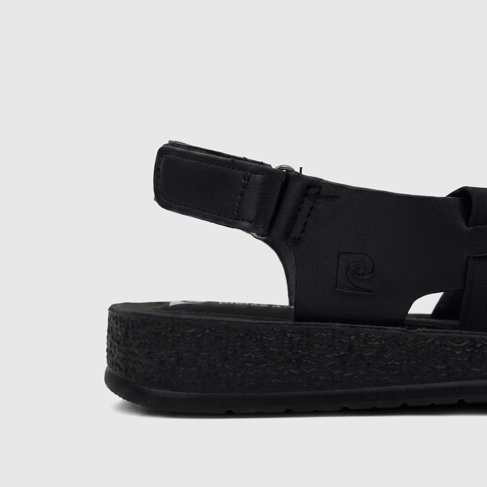 PC Ladies Comfort Sandal PCL10975 Black with a side view, showcasing its textured sole and strap details.