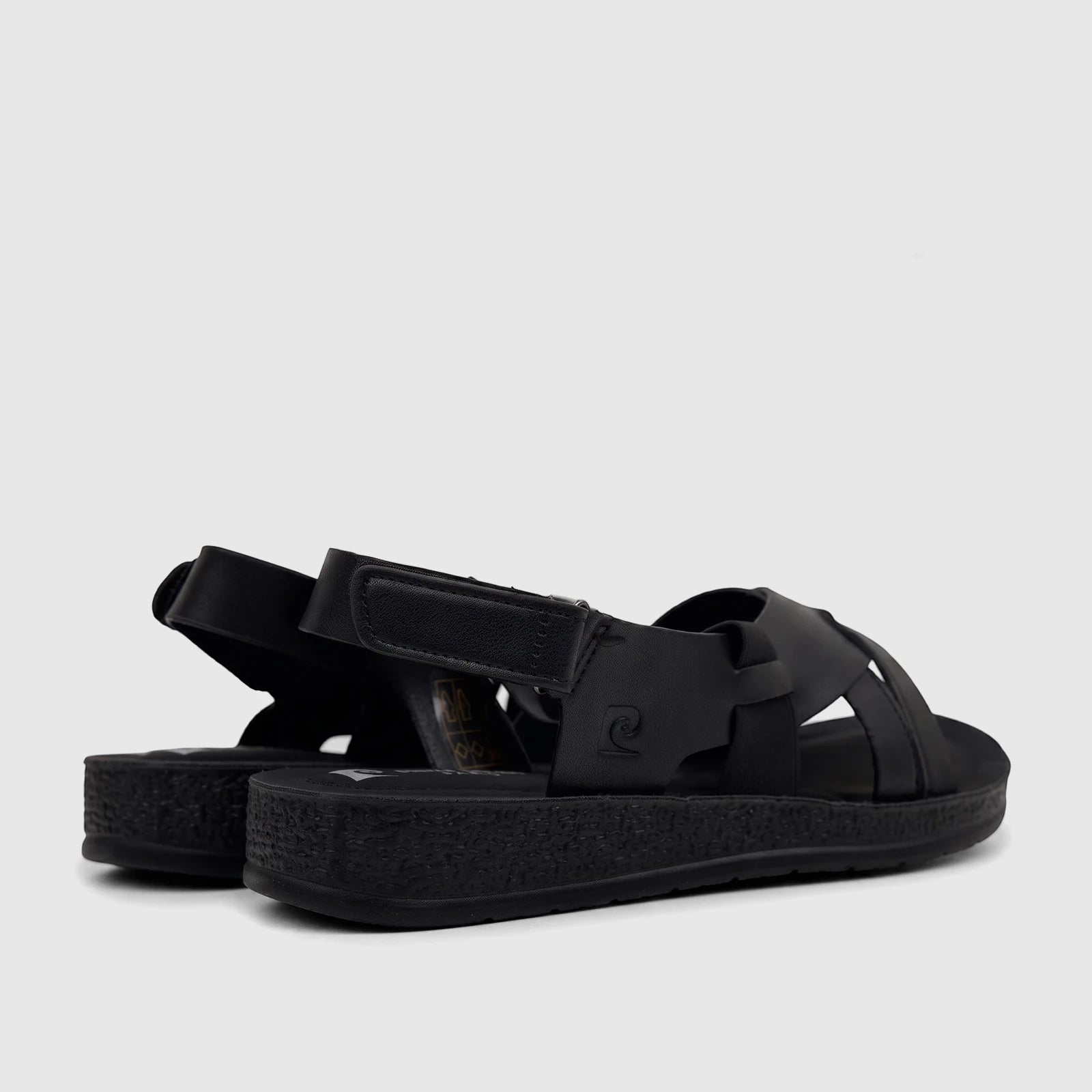 Black PC Ladies Comfort Sandals PCL10975 with adjustable straps and textured sole, shown from a side-rear view.