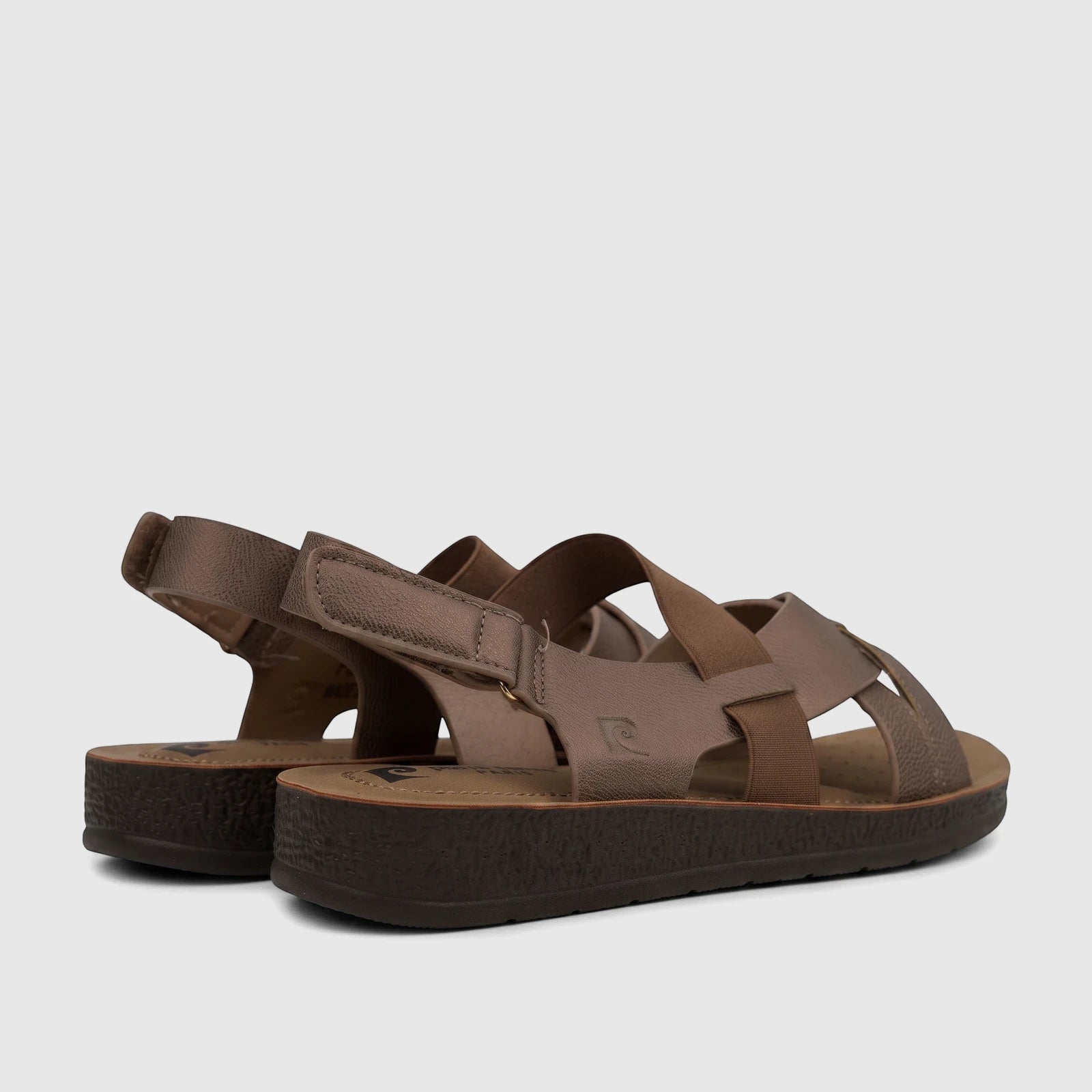 Two bronze PC Ladies Comfort Sandals PCL10975 with elastic straps and textured platform soles, captured from a rear-side