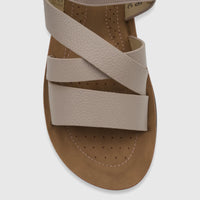 Nude PC Ladies Comfort Sandal PCL10976 featuring textured criss-cross straps and a brown perforated sole, shown from an