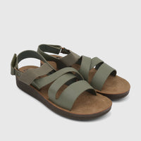 Pair of women's PC Comfort sandals in sage green with brown footbeds and dark brown soles, featuring multiple straps.