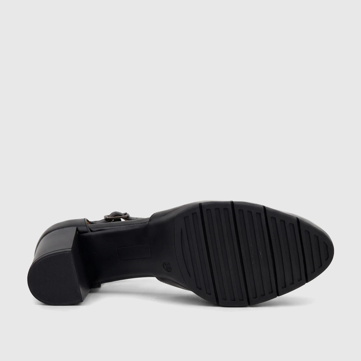 Black PC Ladies Dress Block Heel T Bar shoe, shown from the underside with the textured sole and block heel visible.