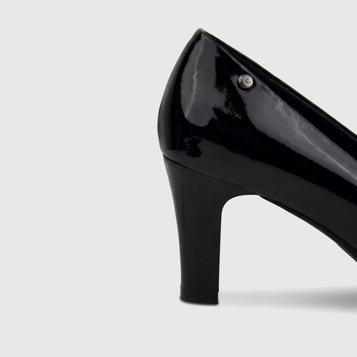 Side profile of a PC Ladies Dress Court PCL10708 in black patent leather with a high block heel.