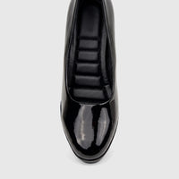 Top-down view of a PC Ladies Dress Court PCL10708 shoe in black patent leather, showcasing its glossy finish and quilted