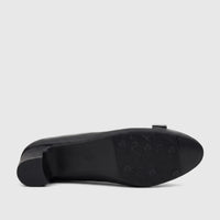 Black PC Ladies Dress Court shoe, PCL11037, with a high heel and patterned sole, shown from the underside view.