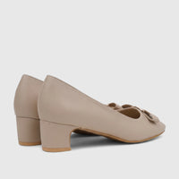 Pair of nude PC Ladies Dress Court shoes with block heels and a gold-tone buckle, viewed from a slightly angled side and