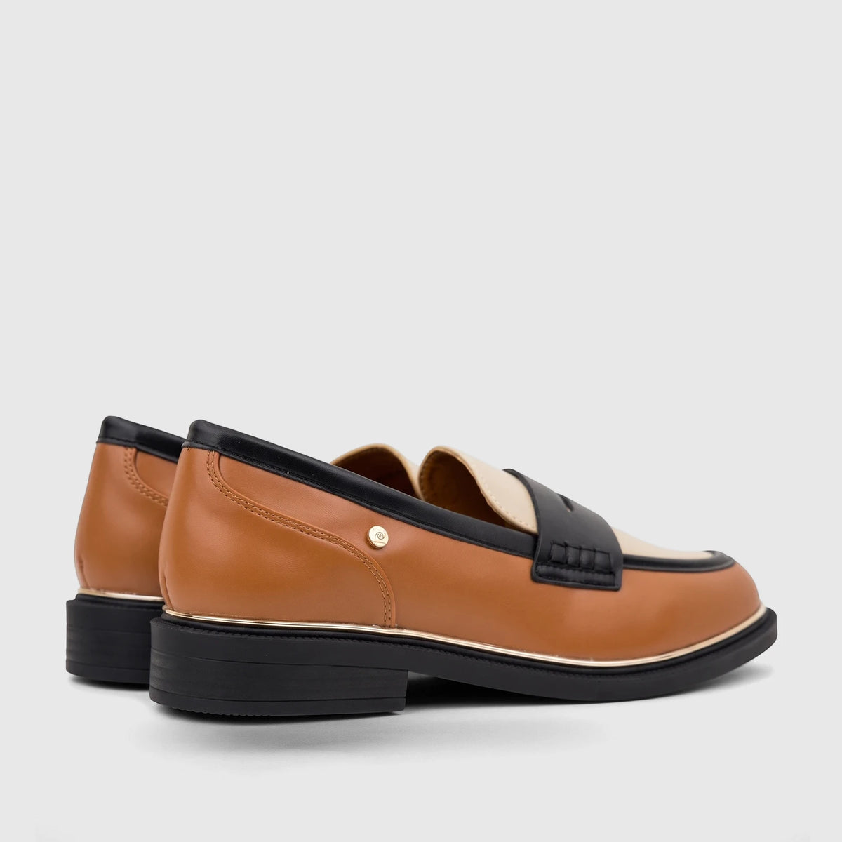 Side view of PC Ladies Dress Loafer PCL10996 in tan, black, and cream multi-color leather with gold trim.