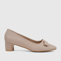 Nude block heel court shoes for ladies with a front bow detail, shown in a side view.