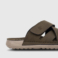 Olive green men's casual comfort sandal with hook-and-loop strap closure, shown in a side view.