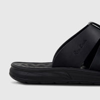 Close-up of a black PC Men's Casual/Comfort Sandal, showing the textured strap with the embossed logo and the sturdy sole.