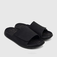 A pair of black PC Men's Casual Comfort Sandals (PCM00815) with a mono color design, featuring an adjustable strap.