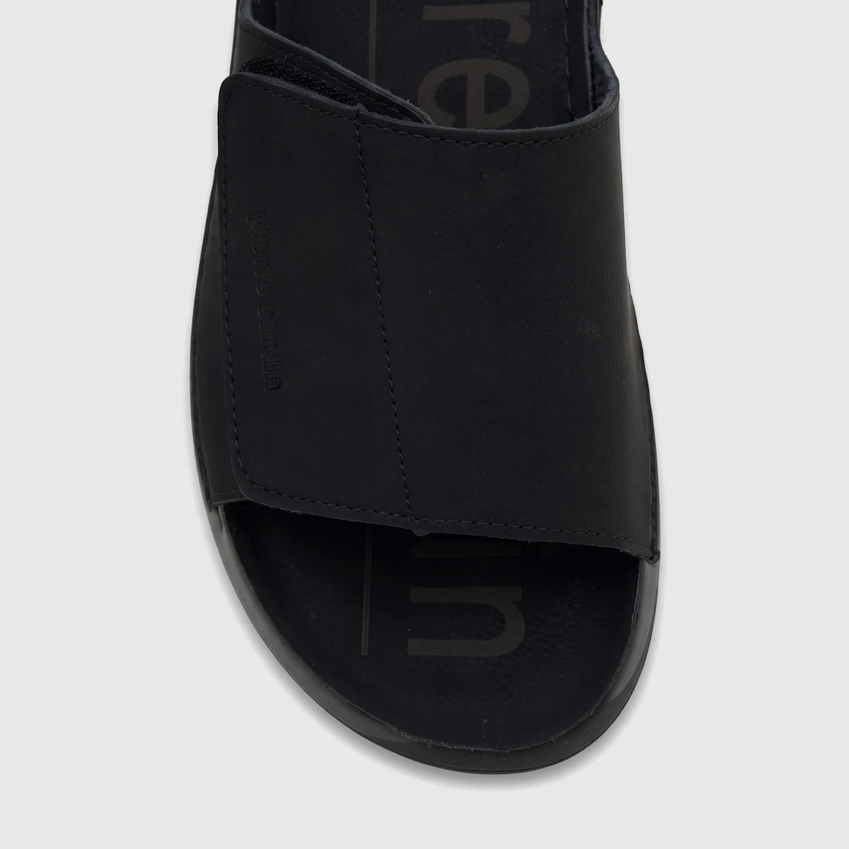 Black PC Men's Casual Comfort Sandal PCM00815 with a wide strap featuring an embossed logo, shown from an overhead