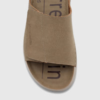 Taupe Pierre Cardin men's casual comfort sandal, close-up top view showing textured strap and sole.
