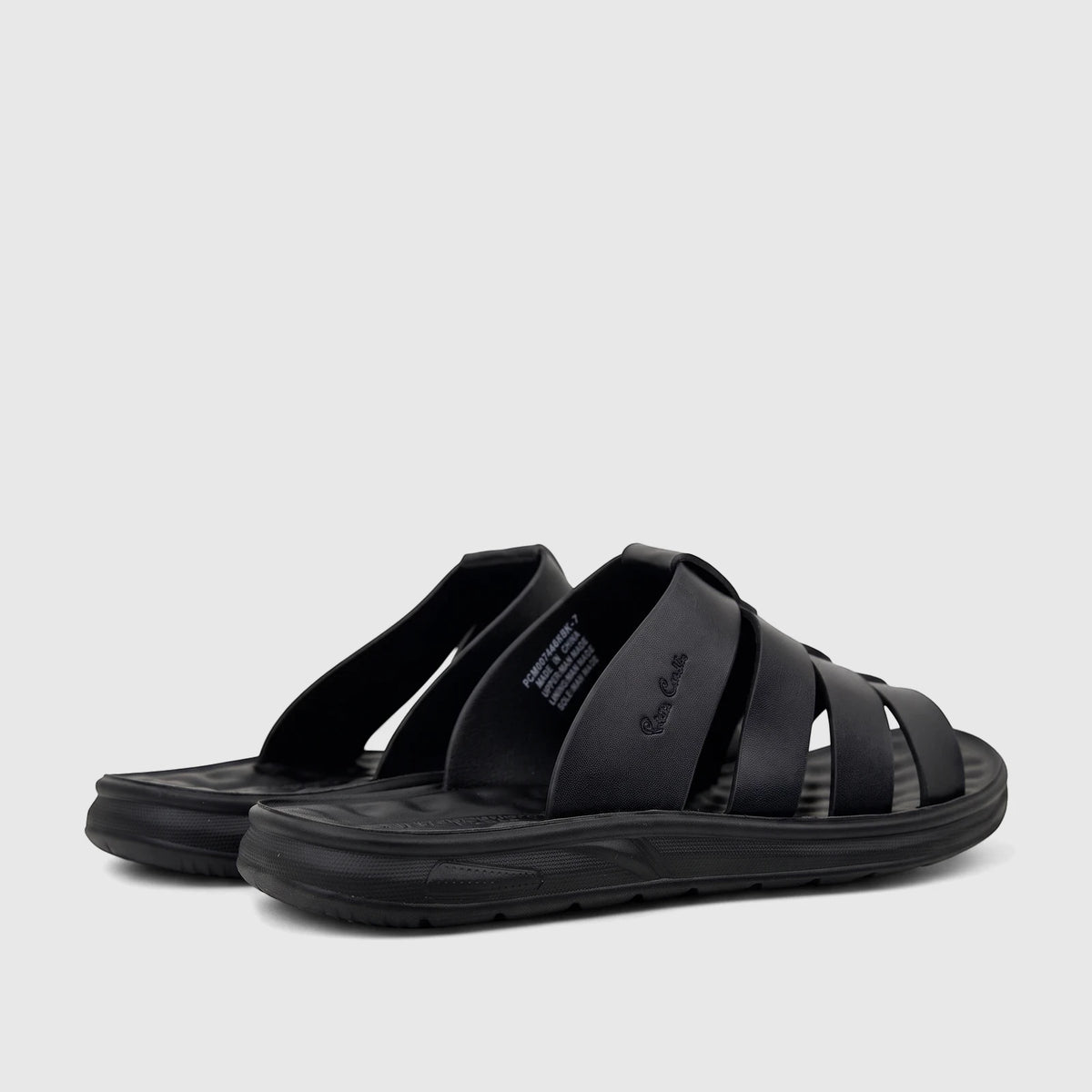 A pair of black PC Men's Casual Comfort Sandals with criss-cross straps, seen from a side view.