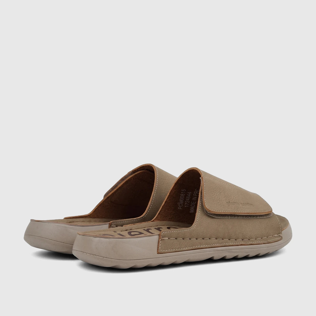Taupe men's casual comfort sandals with a hook-and-loop strap, featuring visible stitching and a textured upper, side view.