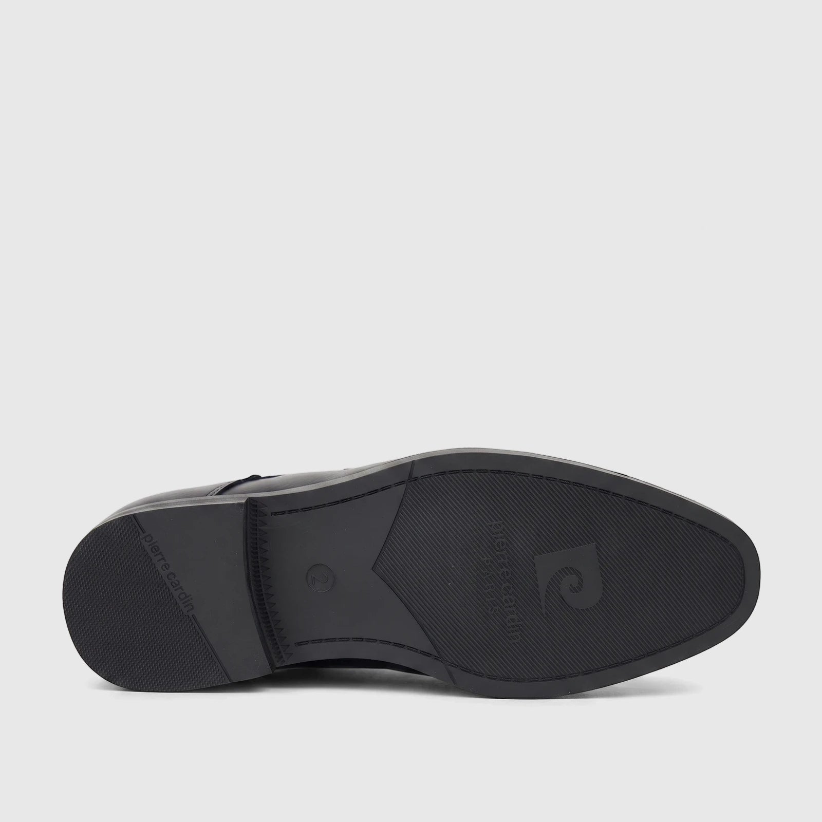 Black Pierre Cardin Boys Youth dress shoe, featuring a detailed view of its textured sole with branding.