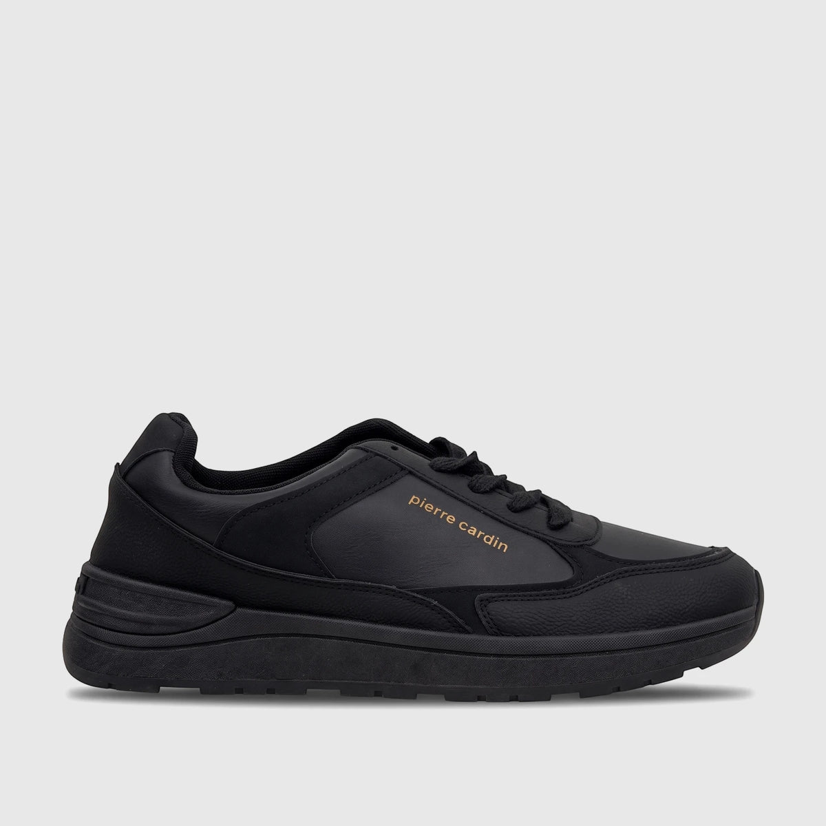 Pierre Cardin black casual sneaker for women, shown from a side view, featuring the golden brand name on the side.