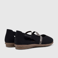 Black Pierre Cardin ladies casual pumps with metallic silver straps and tan soles, viewed from a rear-side angle.