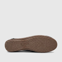 Underside view of a black Pierre Cardin Ladies Casual Pump, PCL10961, featuring a textured brown sole with the brand logo.