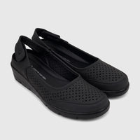 A pair of black Pierre Cardin ladies' casual wedge shoes with perforated uppers and slingback straps, shown from an elevated