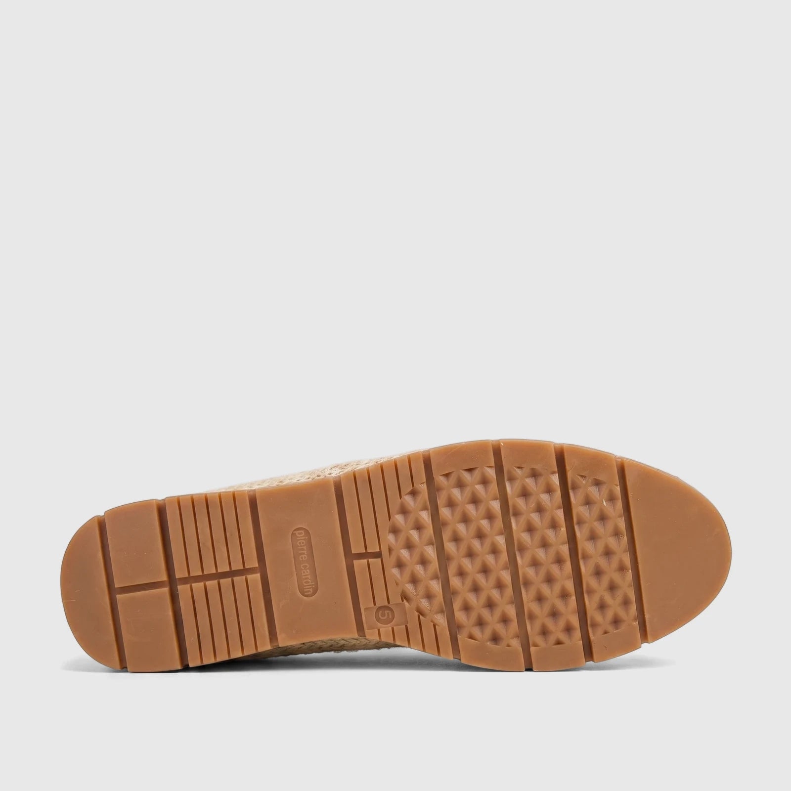 Sole of a Pierre Cardin ladies casual espadrille loafer showing the brown textured rubber sole and woven beige upper.