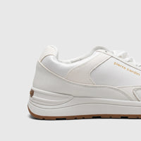 Side view of a Pierre Cardin PCL10987 white casual sneaker with a white upper, white laces, and a brown rubber sole.
