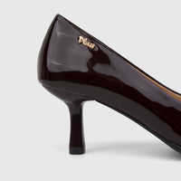 Close-up side view of a Plum Ladies Dress Court Cameron PL970004 pump in dark chocolate patent leather with a high heel.