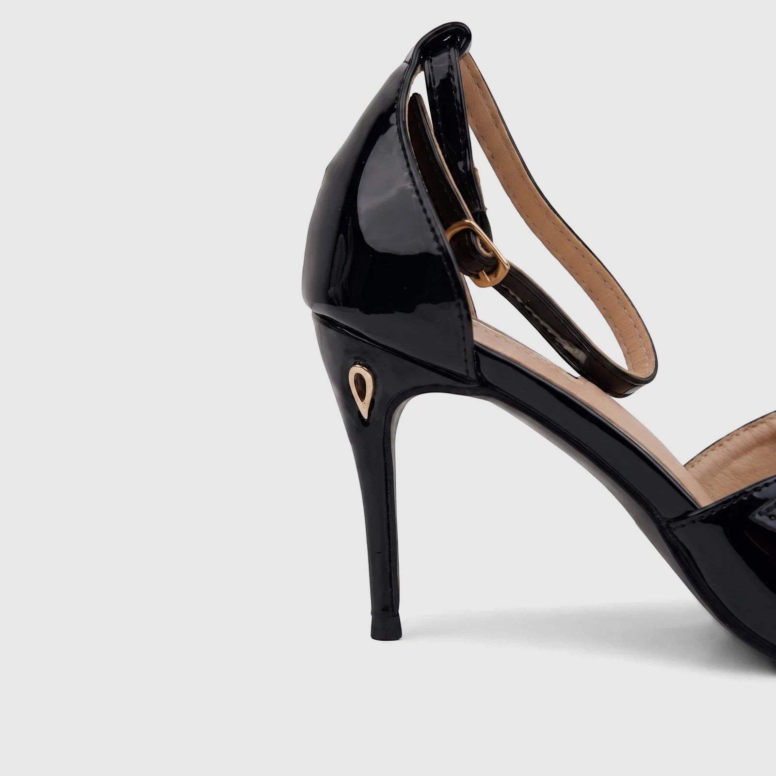 Plum Ladies Dress Court Raven PL095622 Black LP2 high heel pump with ankle strap and gold buckle details.