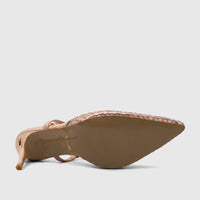 Nude pointed-toe slingback court heel with studded mesh upper, shown from the underside with the sole and heel visible.