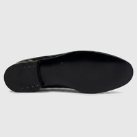 Bottom view of a black Roberto Cavalli Men's Leather Dress Loafer, showcasing the polished leather sole and heel.