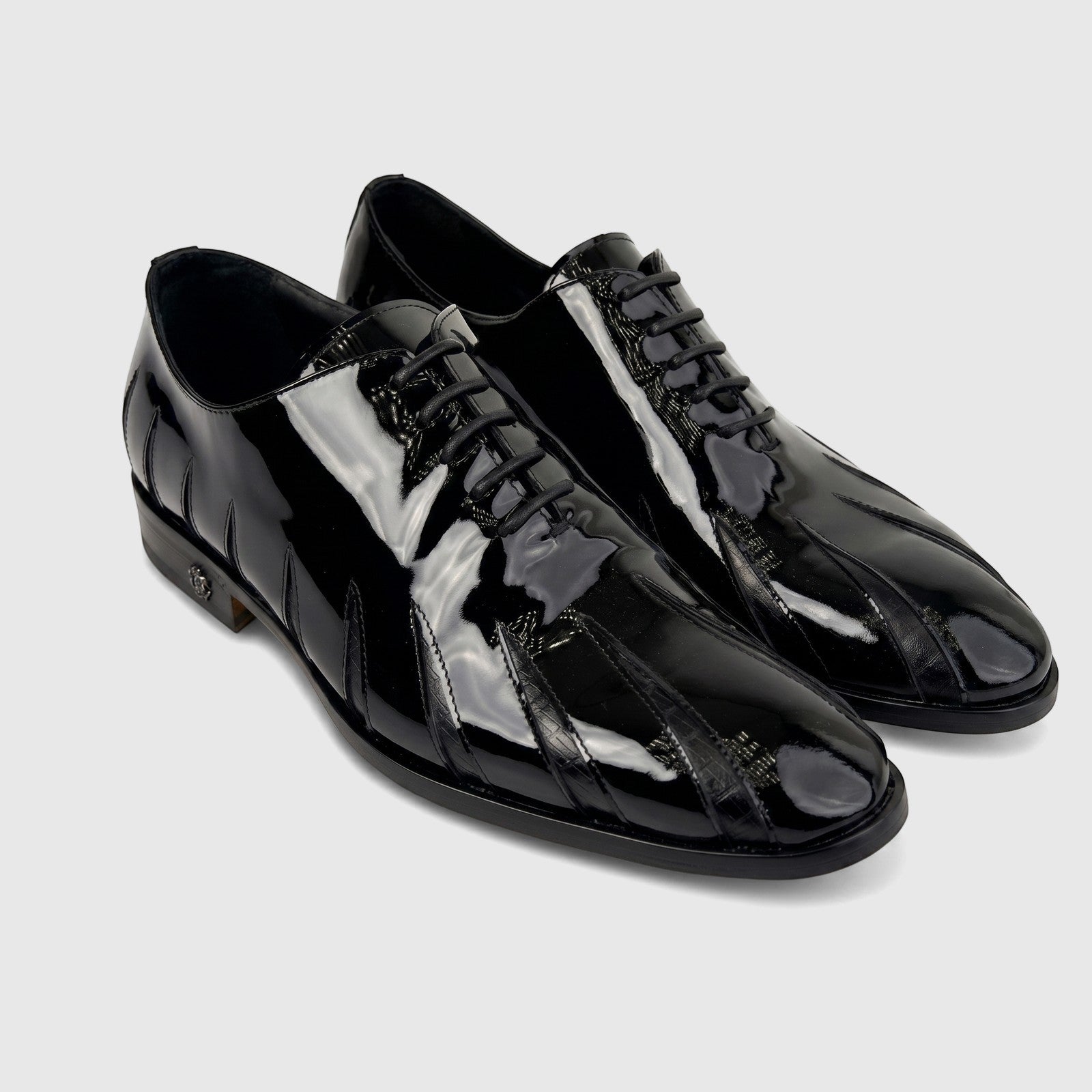 Roberto Cavalli Men's Black Patent Leather Dress Oxford 30713 shoes. Angled view, glossy finish, unique textured details.