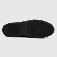 View of the black sole of a Roberto Cavalli Men's Leather Sneaker 30720, featuring a wavy traction pattern.