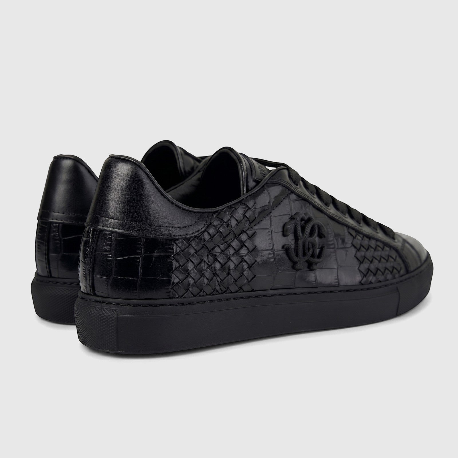Roberto Cavalli Men's Leather Sneaker 30720 in black, featuring woven and crocodile-embossed textures, shown from a