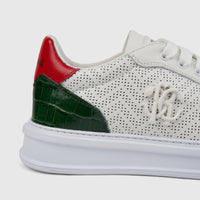 Roberto Cavalli men's leather sneaker in white with perforated sides, green crocodile-embossed accents, and a red heel.