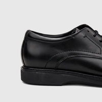 Close-up of a black leather Rockport Men's Dress/Comfort Lace Up Leonard shoe, showing the side and heel.