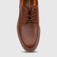 A close-up view of a single Rockport Men's Leonard British Tan leather dress comfort lace-up shoe.